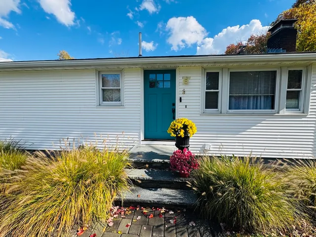 a view of a back yard of the house