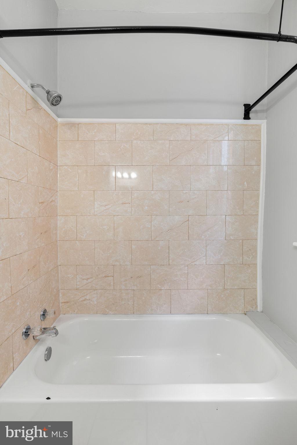 147 Manheim Street Philadelphia, PA 19144 - Photo 21 of 37 a bathroom with a shower and a bath tub