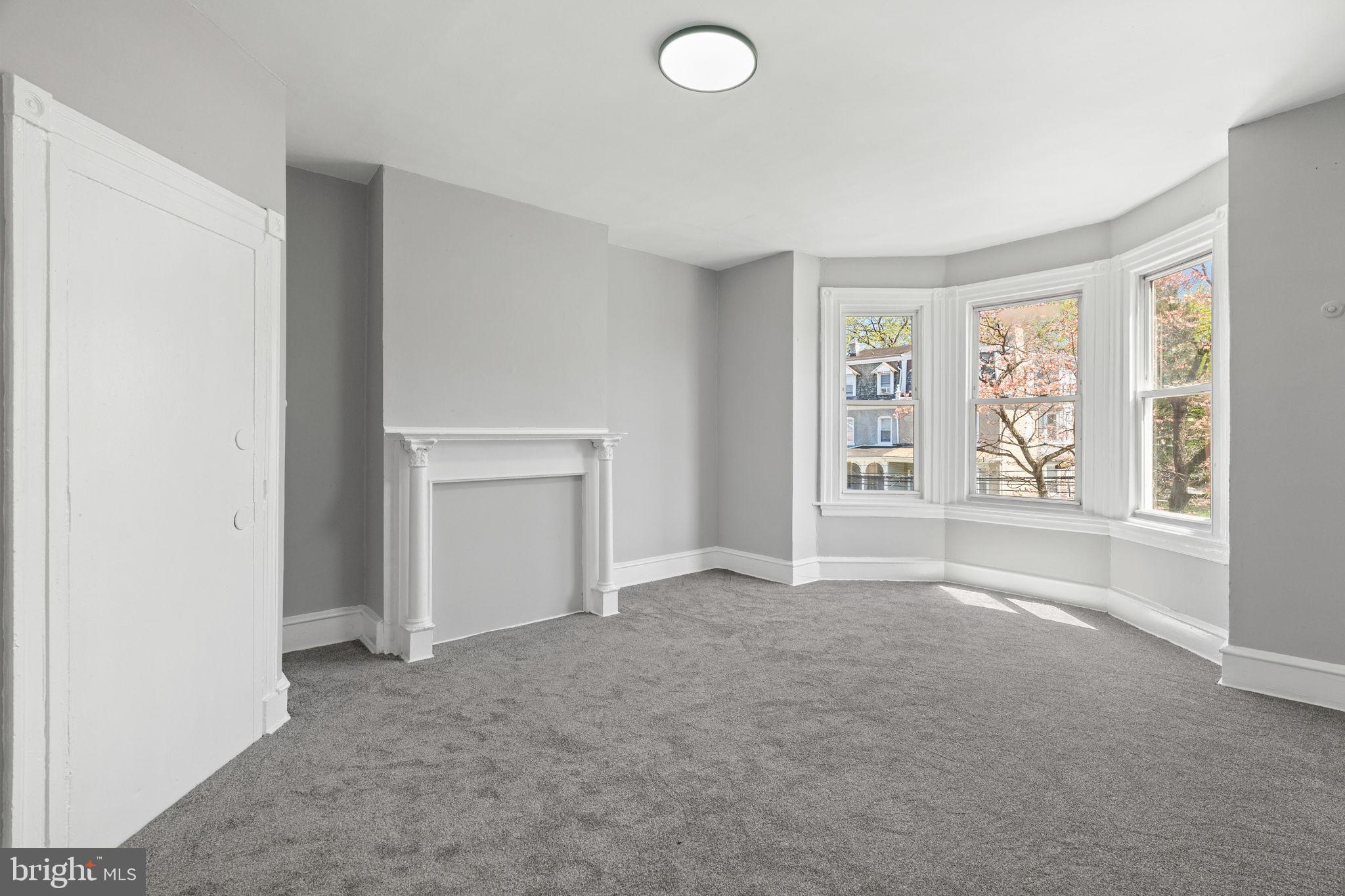 147 Manheim Street Philadelphia, PA 19144 - Photo 22 of 37 an empty room with windows and closet