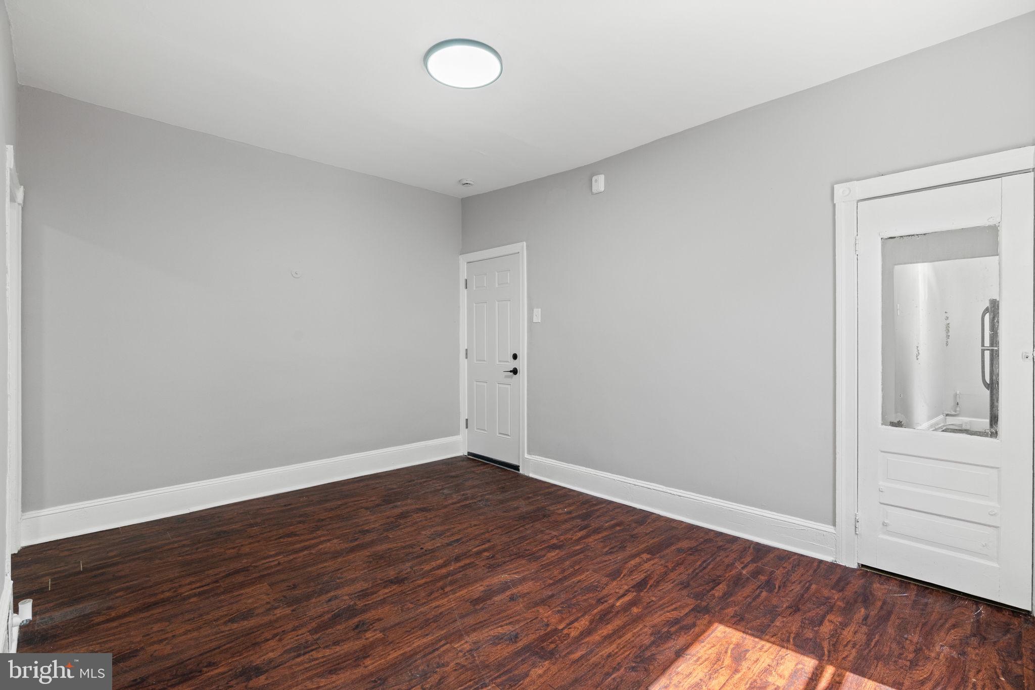 147 Manheim Street Philadelphia, PA 19144 - Photo 25 of 37 a view of an empty room with wooden floor
