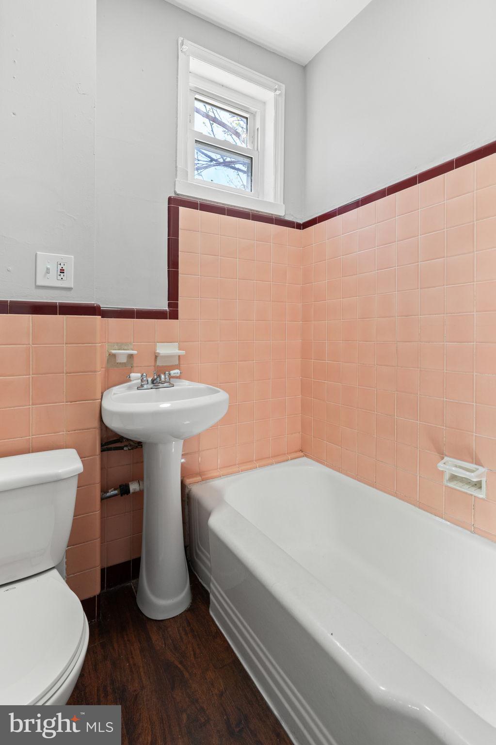 147 Manheim Street Philadelphia, PA 19144 - Photo 30 of 37 a bathroom with a sink toilet and a mirror