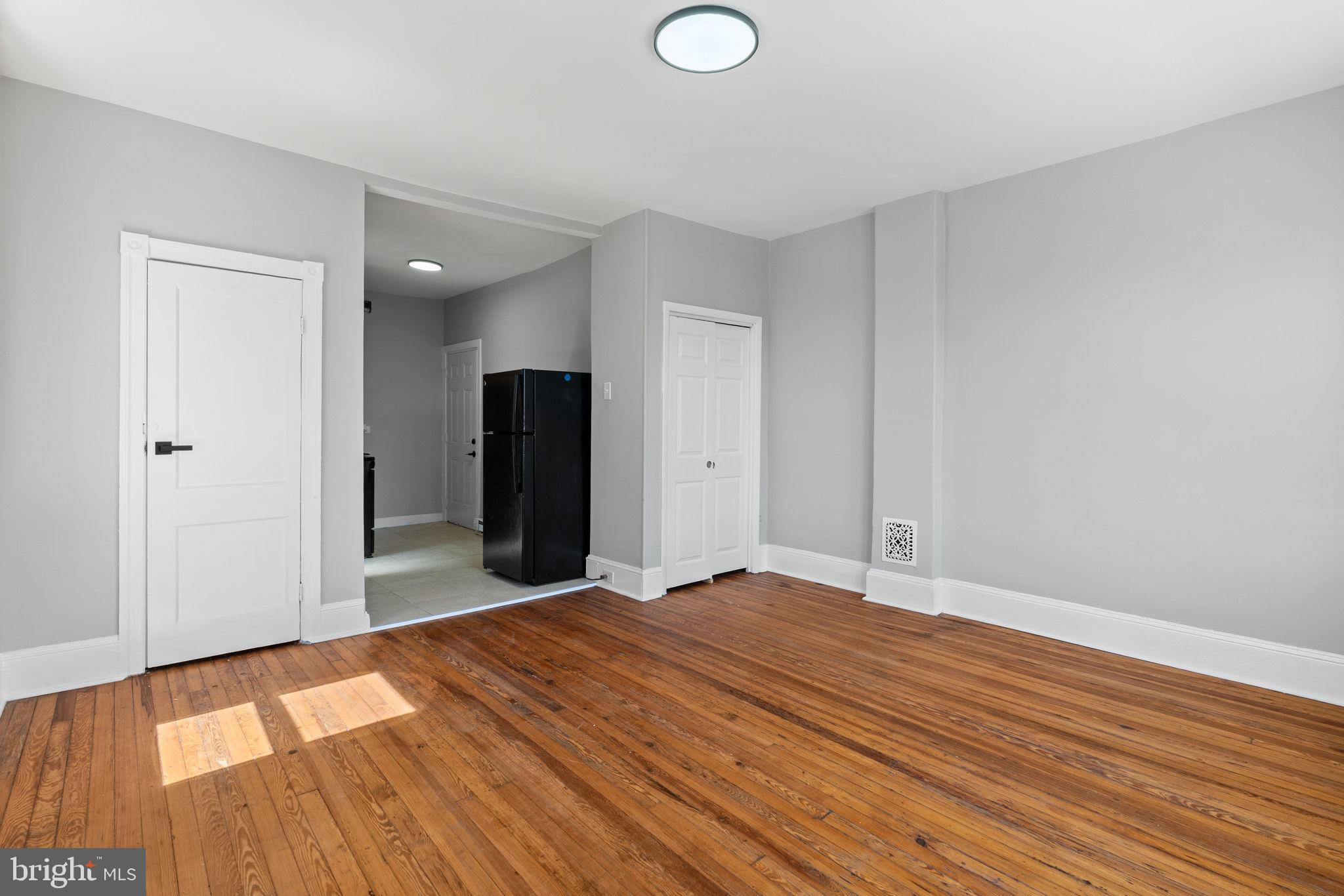 147 Manheim Street Philadelphia, PA 19144 - Photo 37 of 37 a big room with wooden floor
