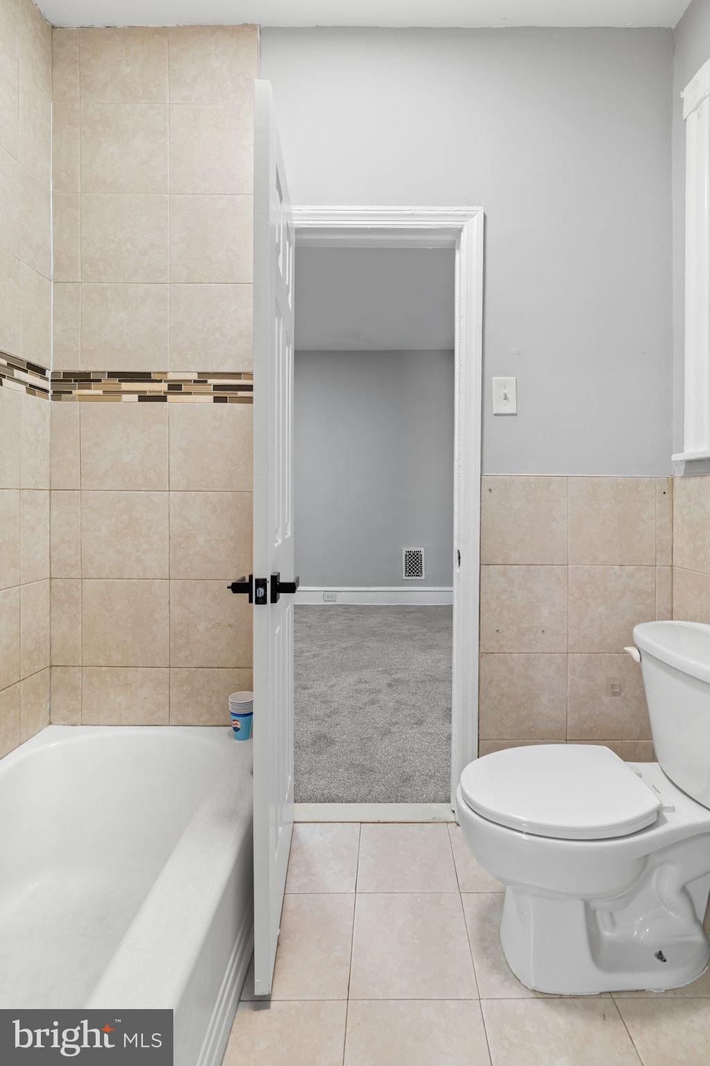 147 Manheim Street Philadelphia, PA 19144 - Photo 10 of 37 a bathroom with a toilet and a shower