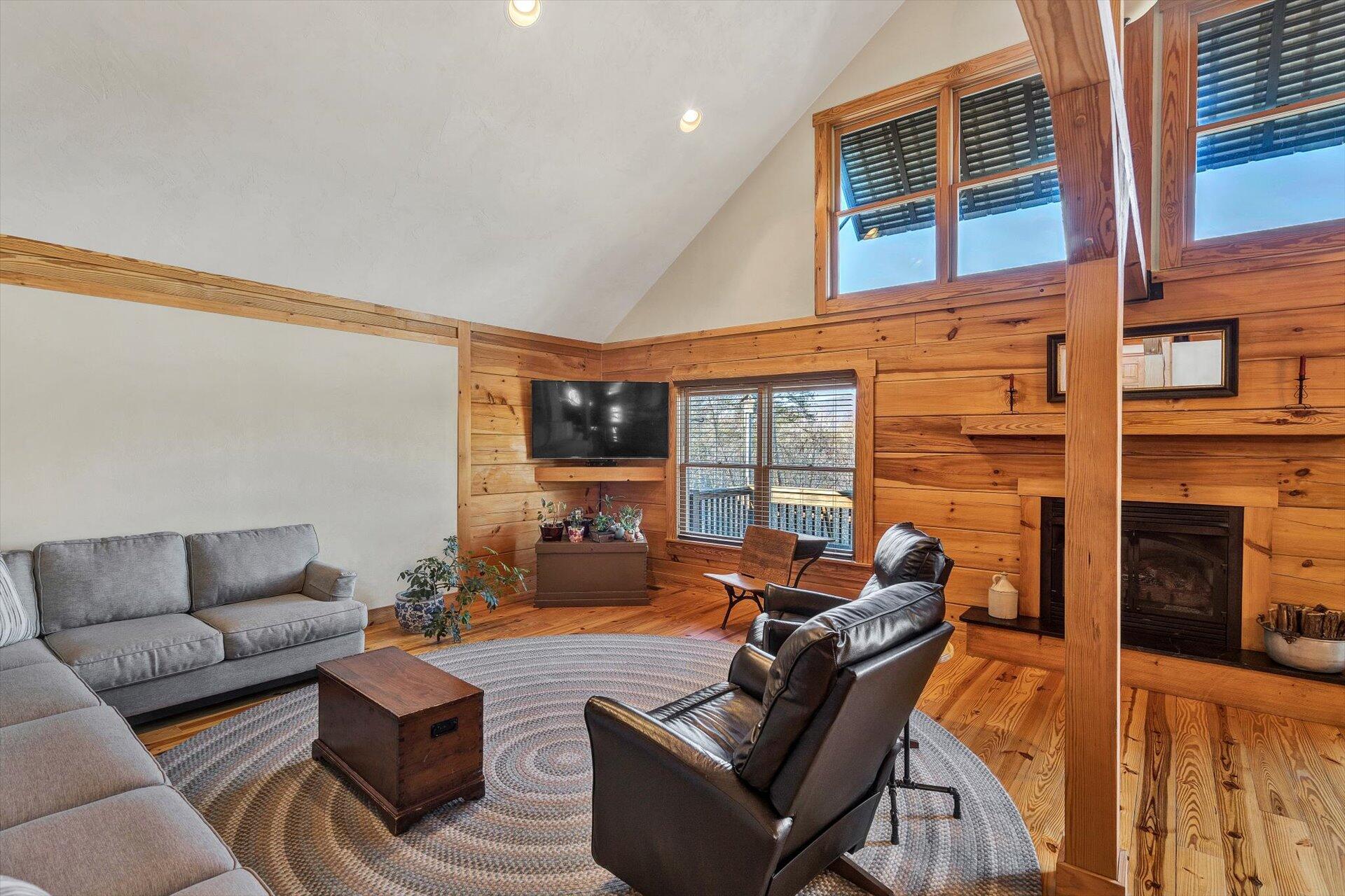 4076 Aerospace Road Roanoke, VA 24014 - Photo 15 of 62 a living room with furniture a fireplace and a large window