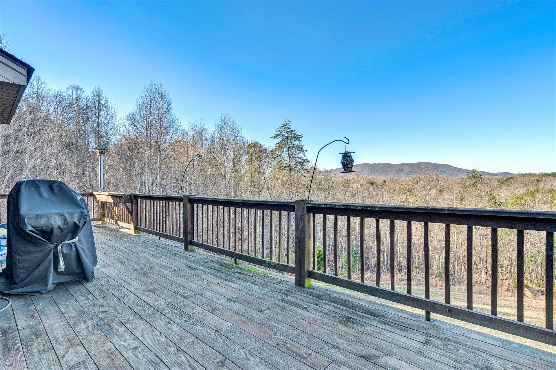 4076 Aerospace Road Roanoke, VA 24014 - Photo 24 of 62 a view of a balcony with chair and wooden floor