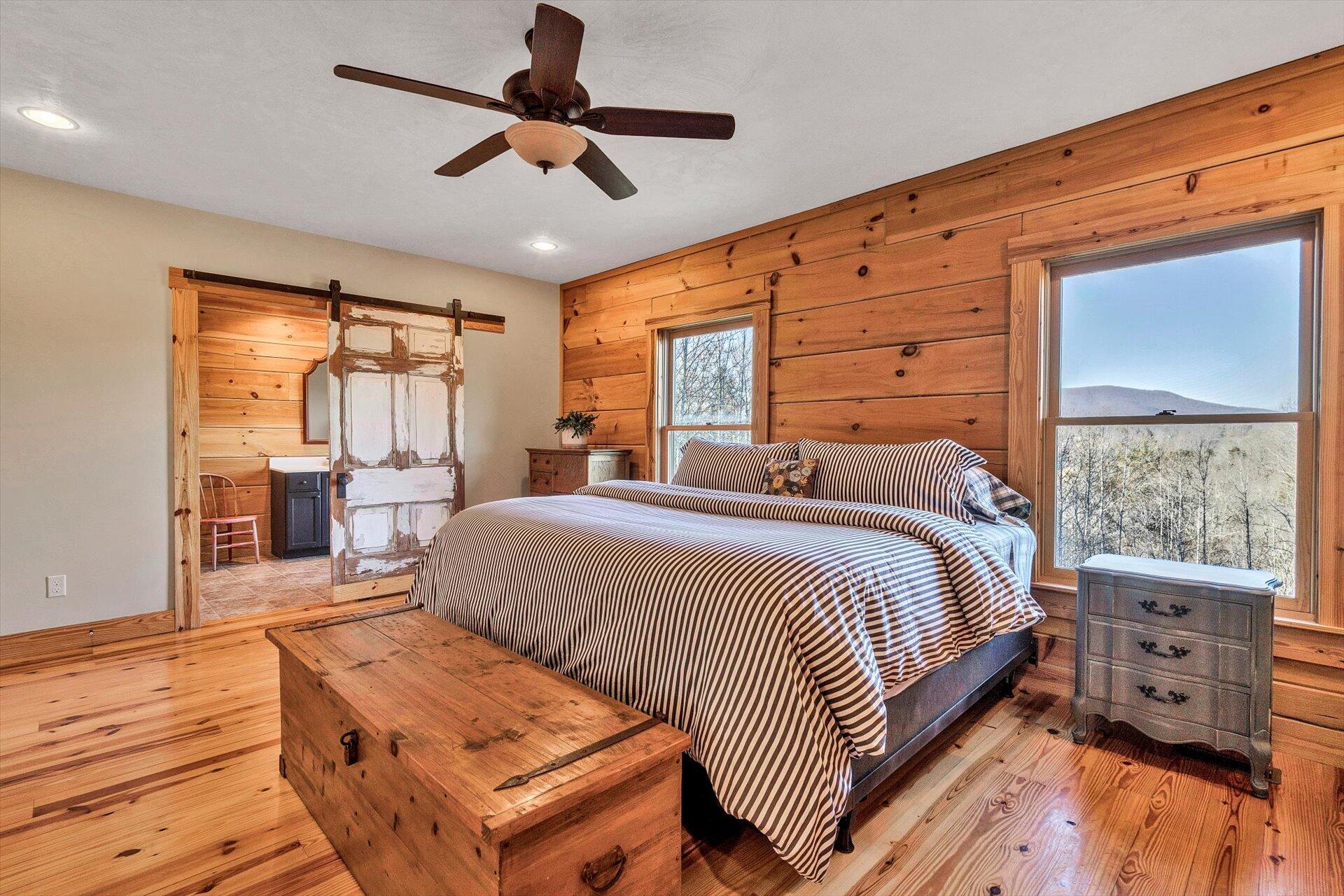 4076 Aerospace Road Roanoke, VA 24014 - Photo 35 of 62 a bedroom with a bed and wooden floor