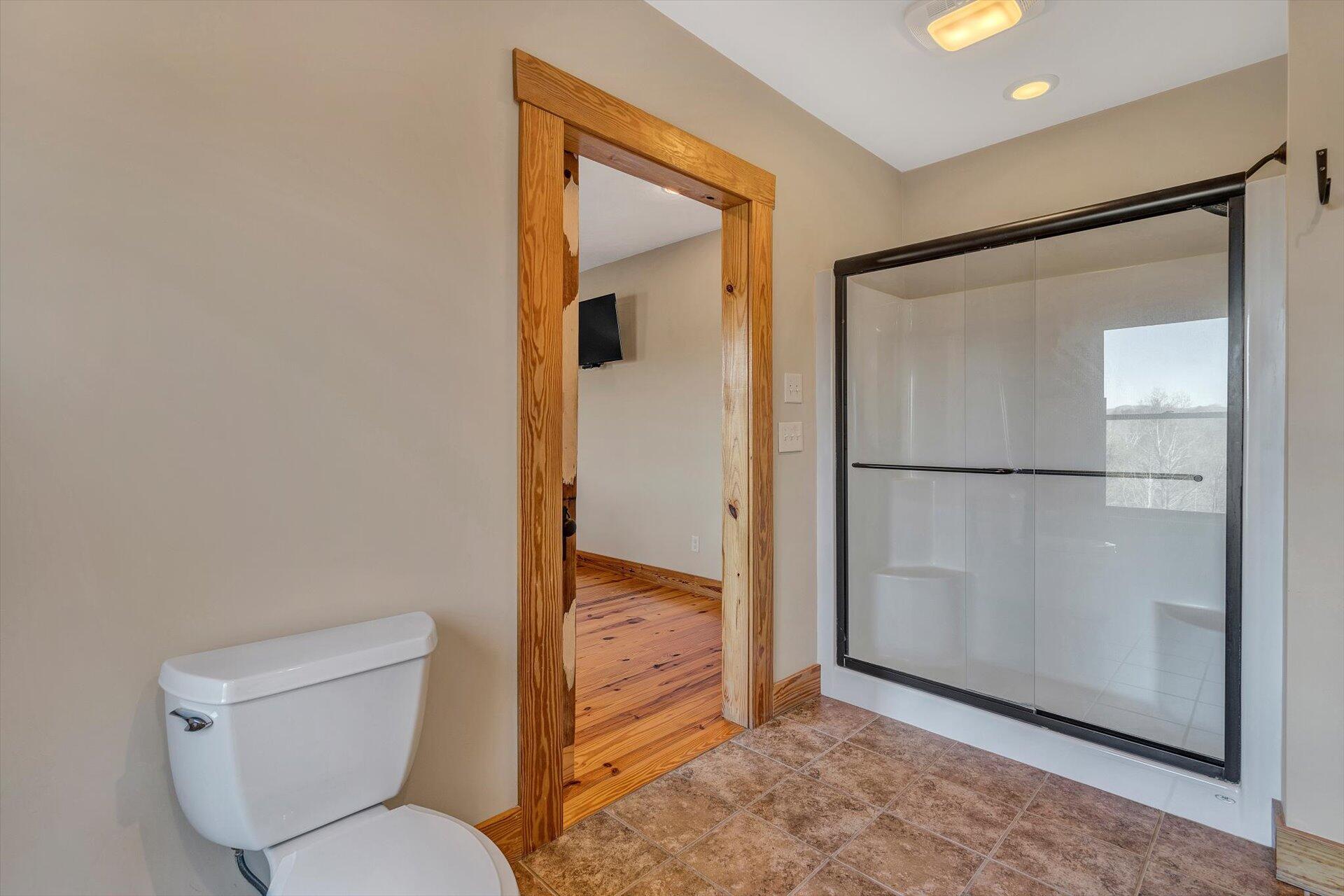 4076 Aerospace Road Roanoke, VA 24014 - Photo 38 of 62 a bathroom with a toilet and a shower