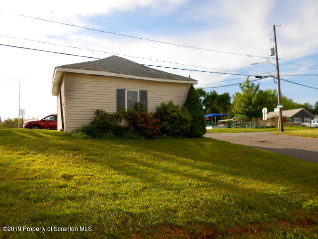451 Main Street Vandling, PA 18421 - Photo 4 of 14 a front view of house with garden
