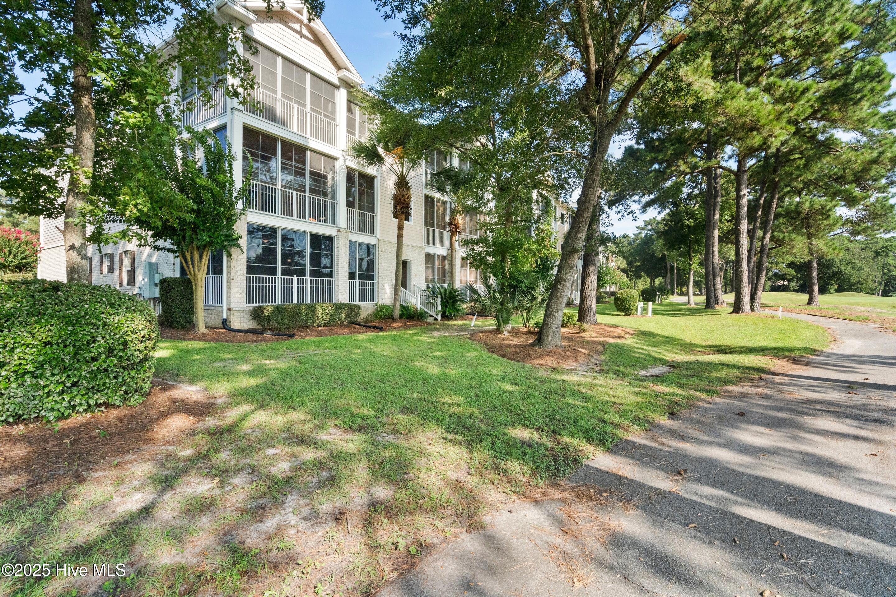 180 Clubhouse Road, Unit 2 Sunset Beach, NC 28468 - Photo 38 of 49 Lf Rear 1