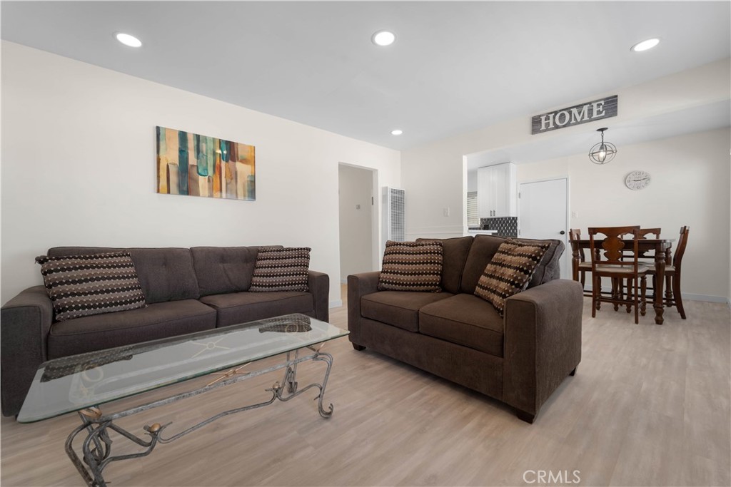 1836 Sunrise Road Barstow, CA 92311 - Photo 3 of 16 a living room with furniture and wooden floor