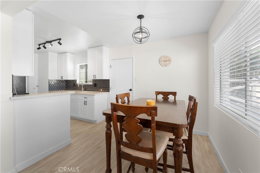 1836 Sunrise Road Barstow, CA 92311 - Photo 5 of 16 a view of a dining room with furniture and a window
