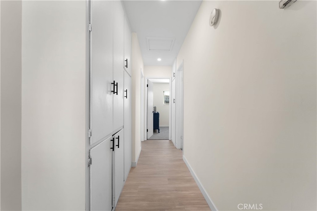 1836 Sunrise Road Barstow, CA 92311 - Photo 8 of 16 a view of a hallway with white walls