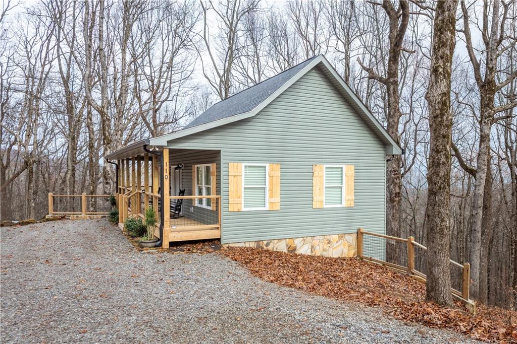 110 Burnt Mountain Cove Road Jasper, GA 30143 - Photo 33 of 33 a front view of a house with a yard