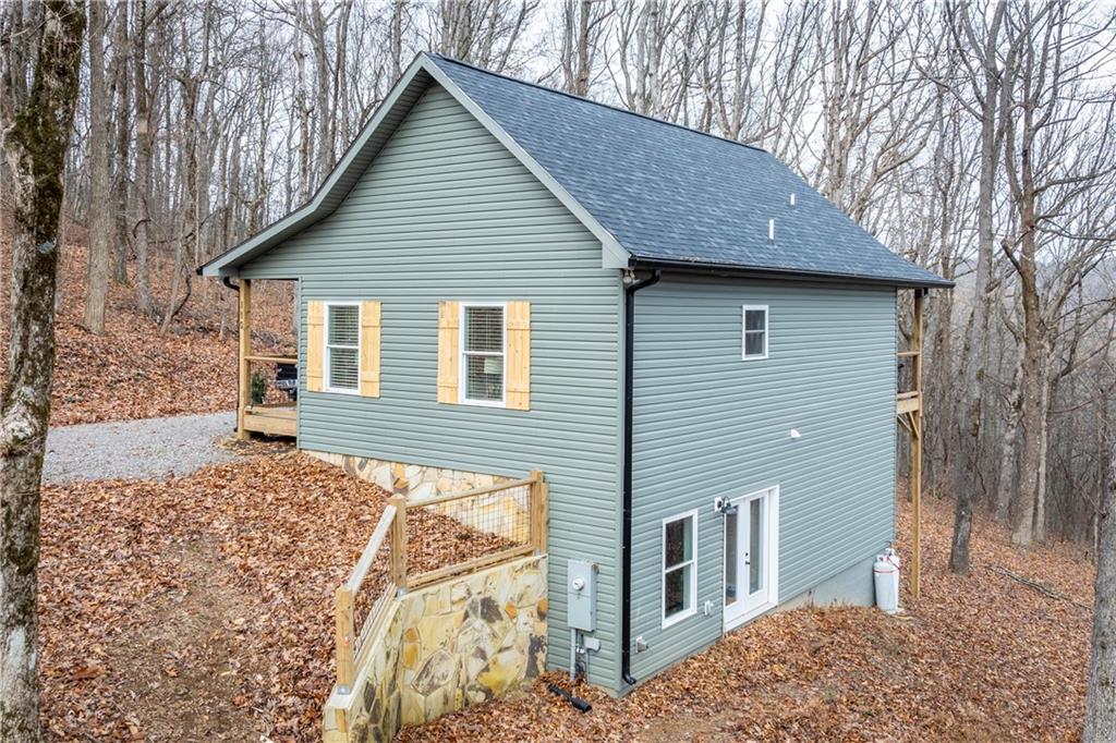 110 Burnt Mountain Cove Road Jasper, GA 30143 - Photo 8 of 33 a backyard of a house