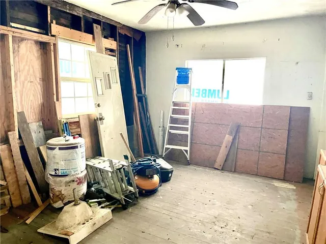 a room with furniture and a window