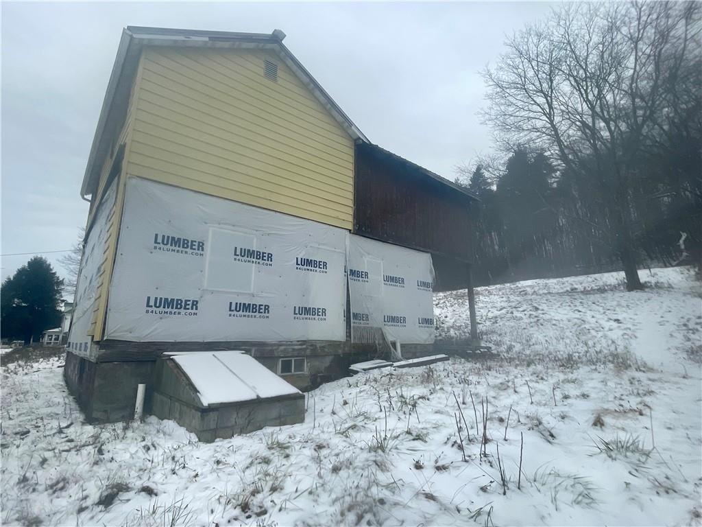 110 Pa-210 Home, PA 15747 - Photo 2 of 14 a front view of a house