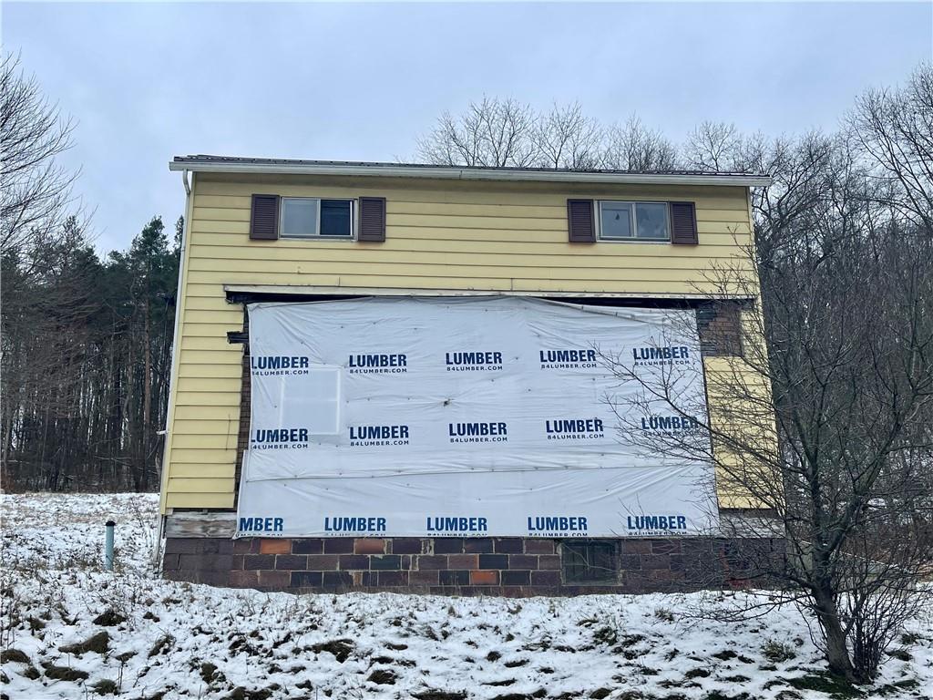110 Pa-210 Home, PA 15747 - Photo 3 of 14 a front view of a house