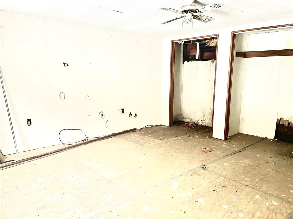 110 Pa-210 Home, PA 15747 - Photo 4 of 14 a view of a room with rack on the wall