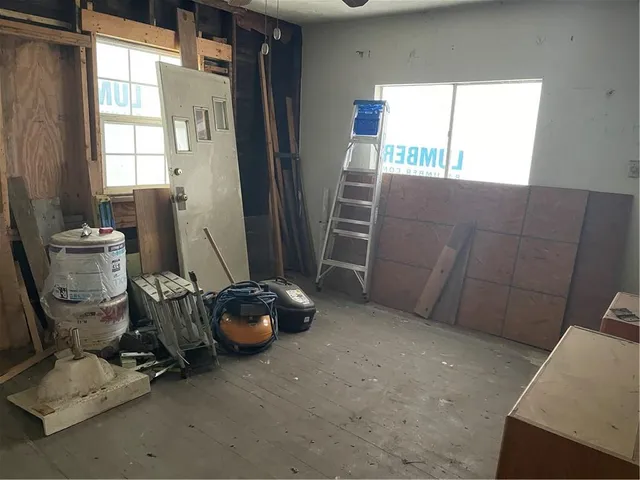 a room with furniture and windows