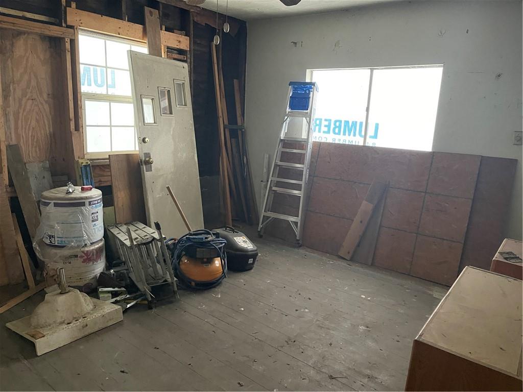 110 Pa-210 Home, PA 15747 - Photo 7 of 14 a room with furniture and windows