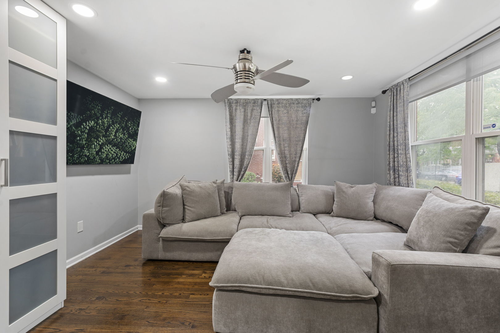 3238 North Kilbourn Avenue, Unit 1 Chicago, IL 60641 - Photo 15 of 17 a living room with furniture and a large window