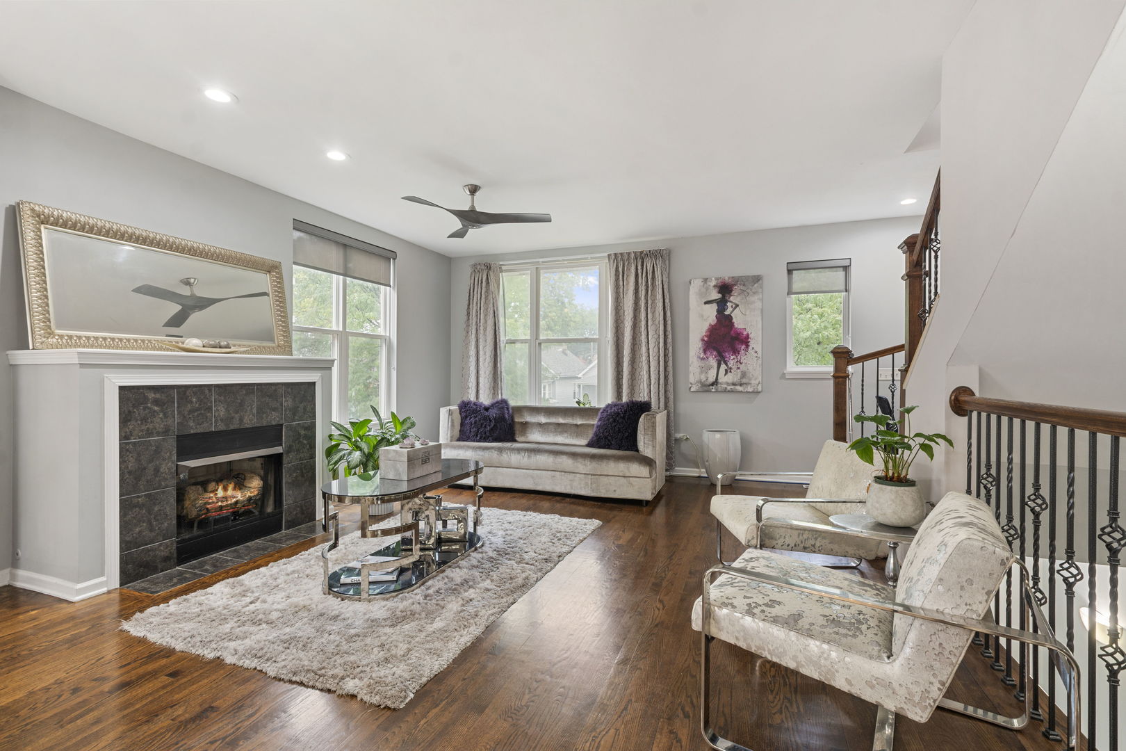 3238 North Kilbourn Avenue, Unit 1 Chicago, IL 60641 - Photo 4 of 17 a living room with furniture and a fireplace