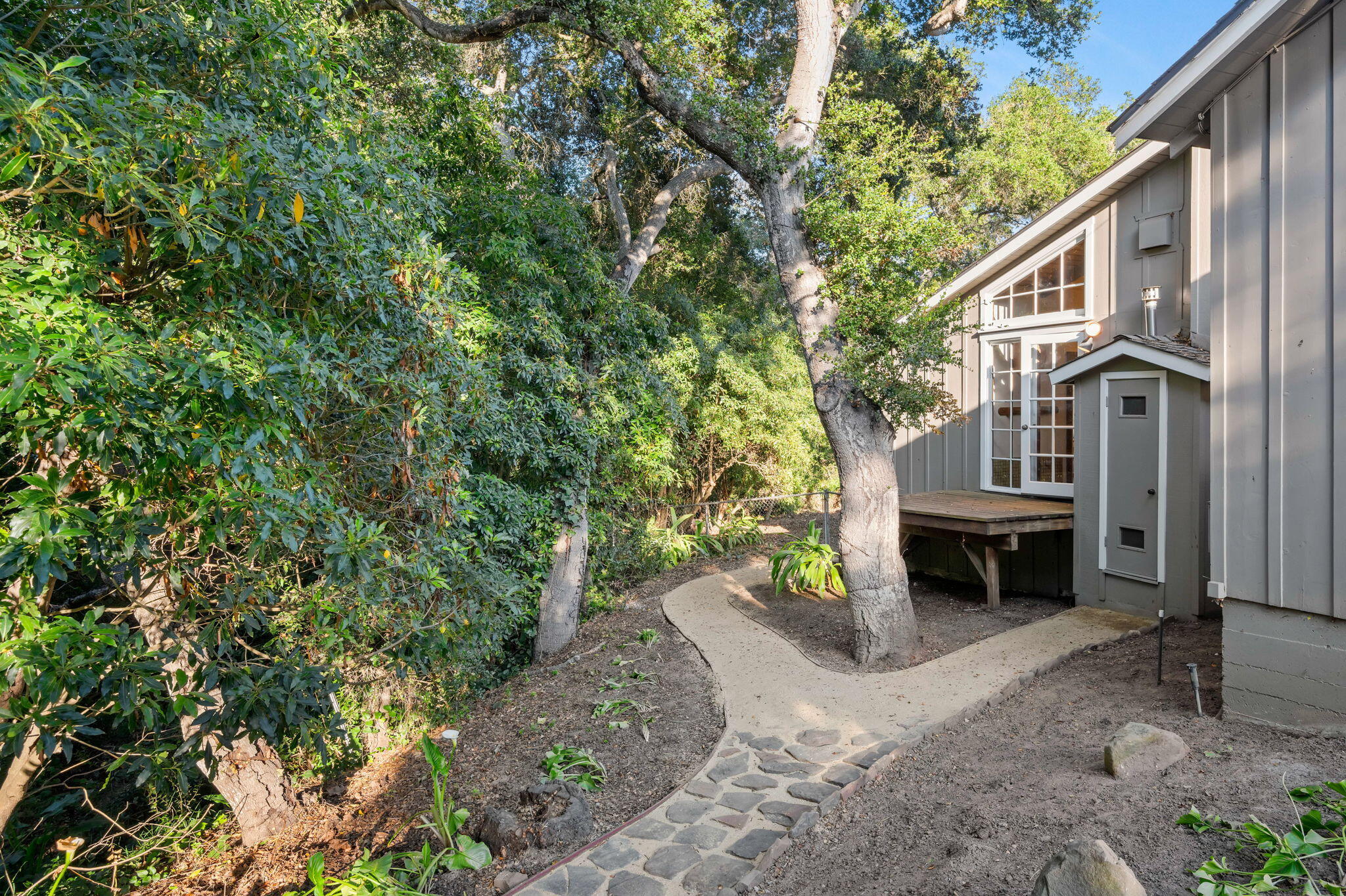 1445 School House Road Montecito, CA 93108 - Photo 22 of 53 a view of a house with a yard