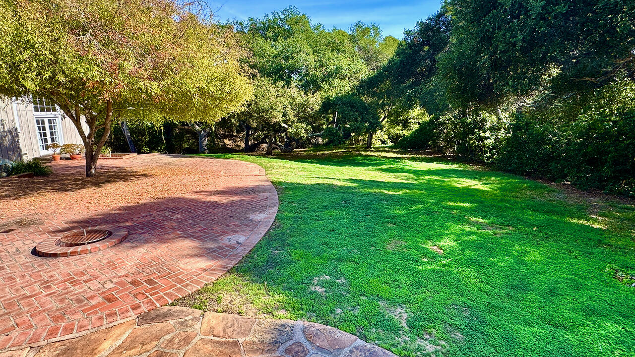 1445 School House Road Montecito, CA 93108 - Photo 29 of 53 a view of a yard with plants and trees