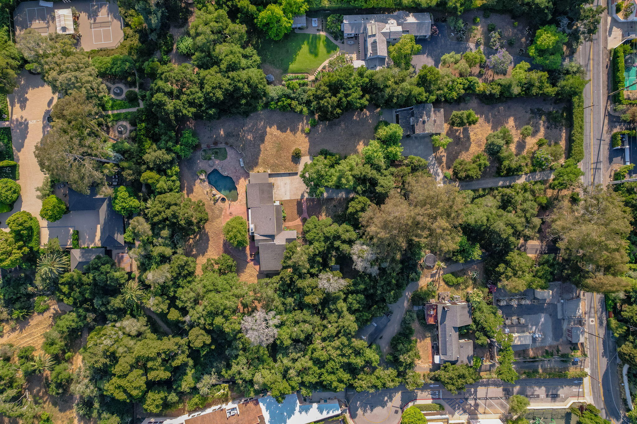 1445 School House Road Montecito, CA 93108 - Photo 3 of 53 an aerial view of a house with a yard and a garden