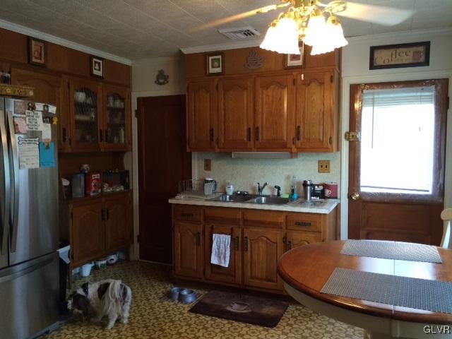 2020 Blue Barn Road Orefield, PA 18069 - Photo 5 of 15 a kitchen with stainless steel appliances granite countertop a refrigerator a stove and a sink