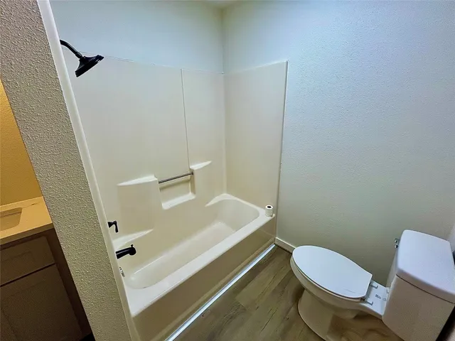 a bathroom with a sink and toilet