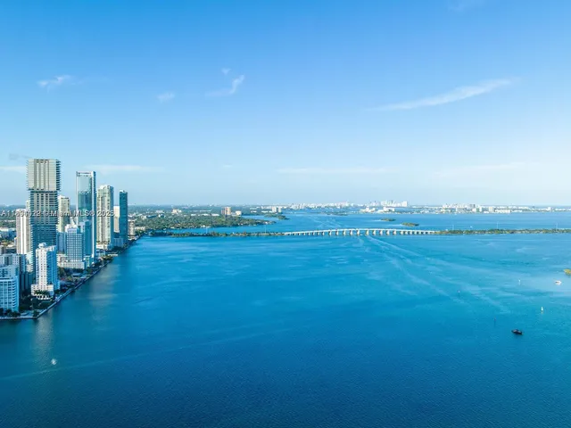 a view of a city with tall buildings