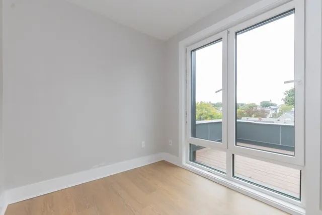 a view of an empty room and window