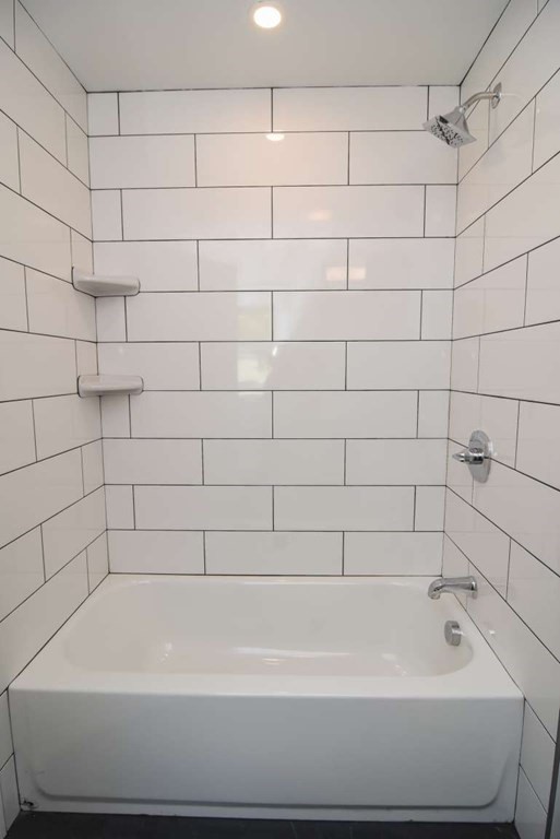 28 Line Road, Unit 1 Wakefield, MA 01880 - Photo 16 of 20 a bathroom with a bathtub