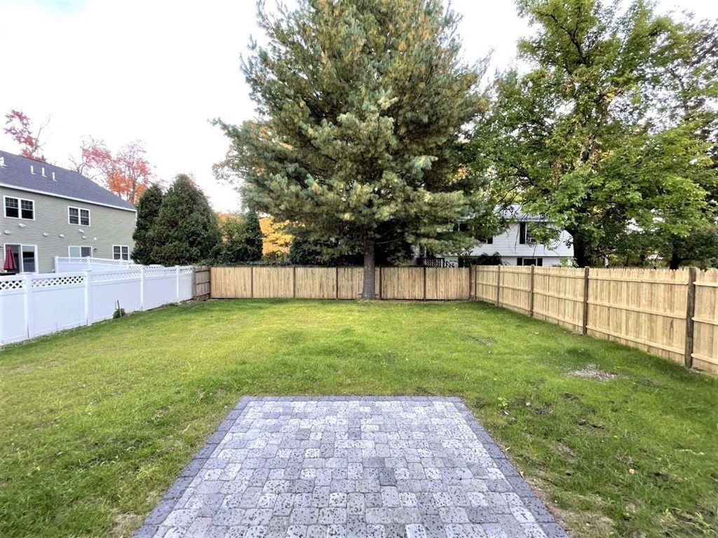 28 Line Road, Unit 1 Wakefield, MA 01880 - Photo 19 of 20 a view of a backyard with a garden