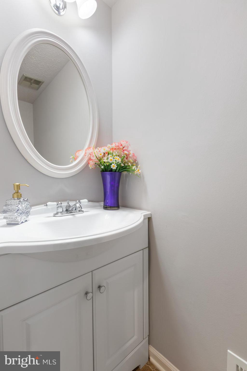 11214 Legato Way Silver Spring, MD 20901 - Photo 13 of 35 Updated main level half bath