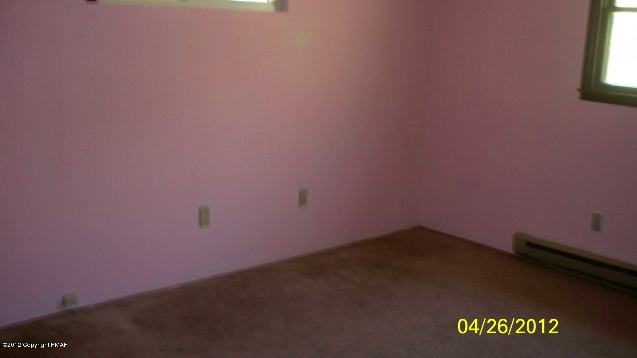 262 Decker Road Bushkill, PA 18324 - Photo 5 of 8 a view of an empty room
