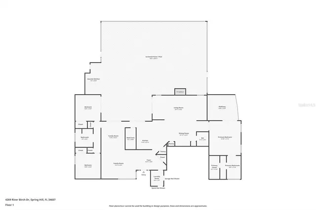 an aerial view of residential houses with outdoor space and ocean view