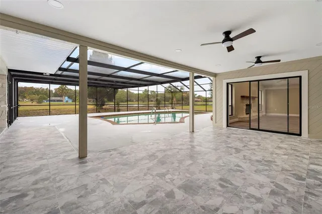 a kitchen with stainless steel appliances a refrigerator and a stove top oven