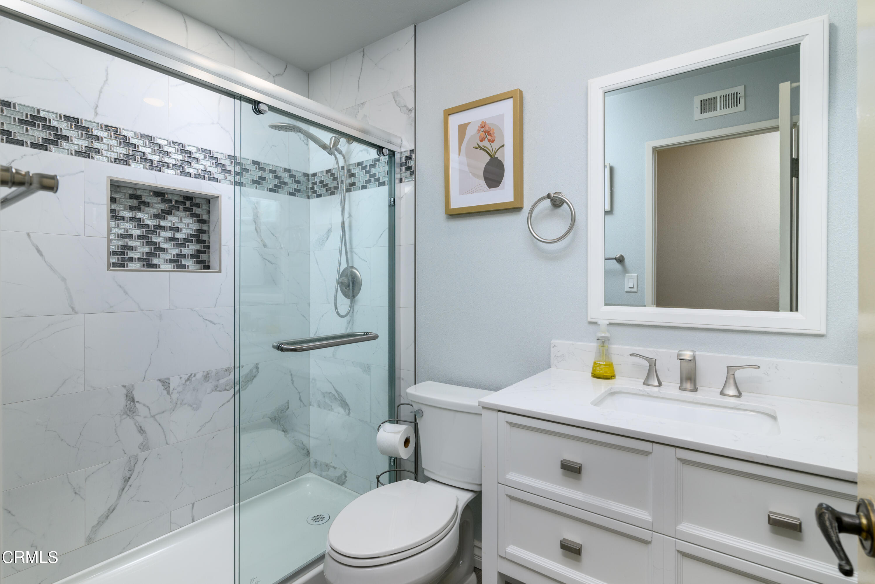 2564 Roxy Street Simi Valley, CA 93065 - Photo 16 of 25 a bathroom with a granite countertop toilet sink and shower