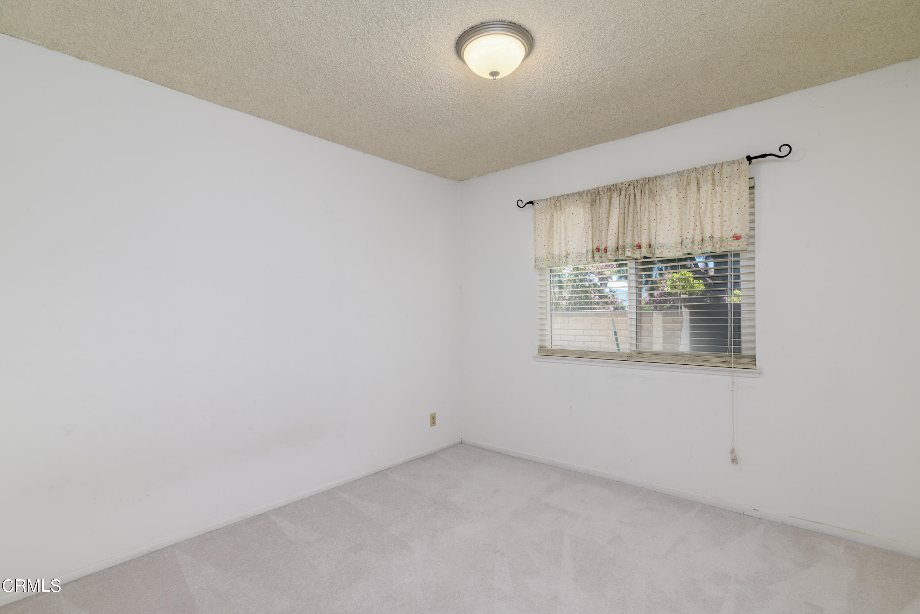 2564 Roxy Street Simi Valley, CA 93065 - Photo 17 of 25 an empty room with a window