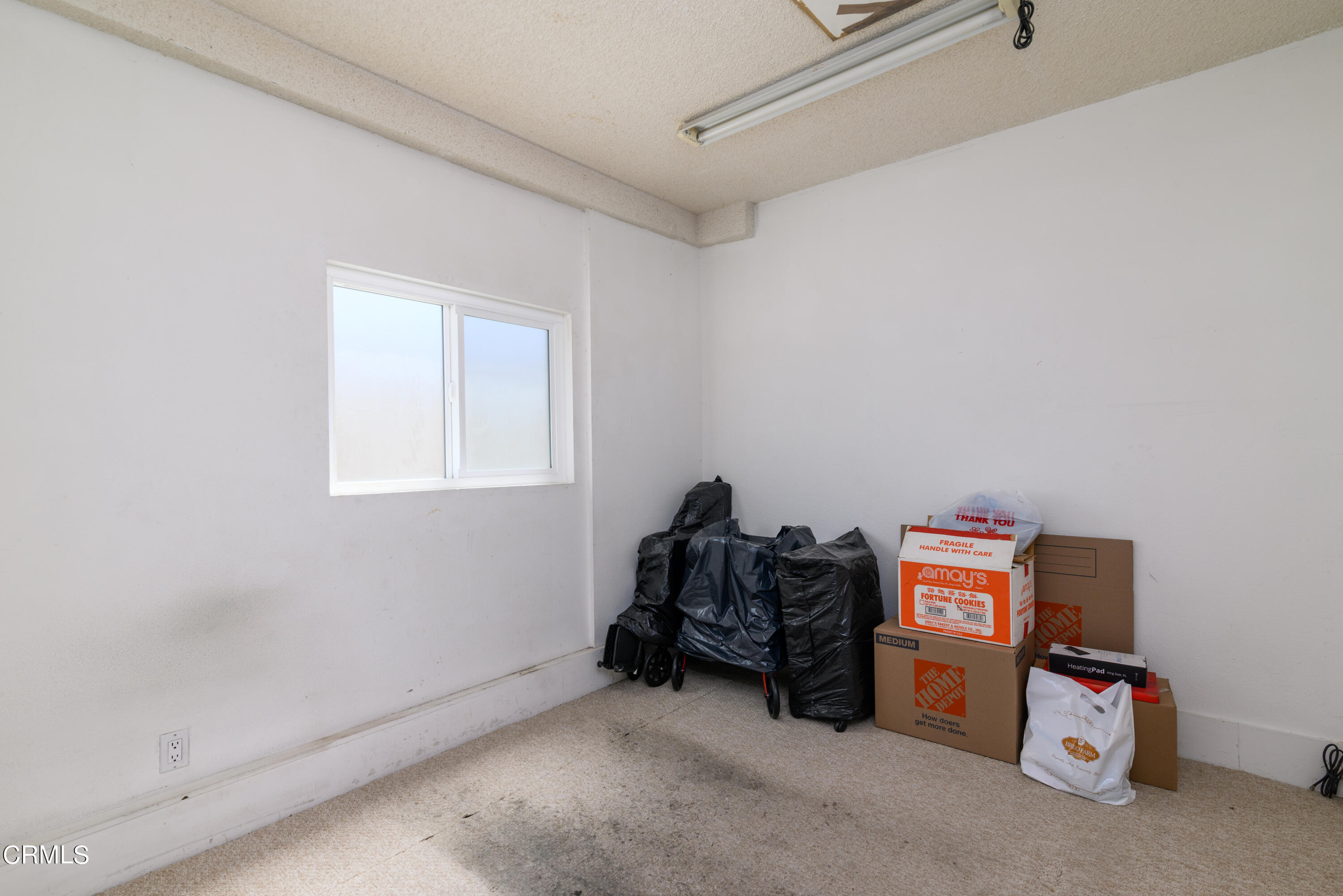2564 Roxy Street Simi Valley, CA 93065 - Photo 20 of 25 a room with a baby crib and a dresser