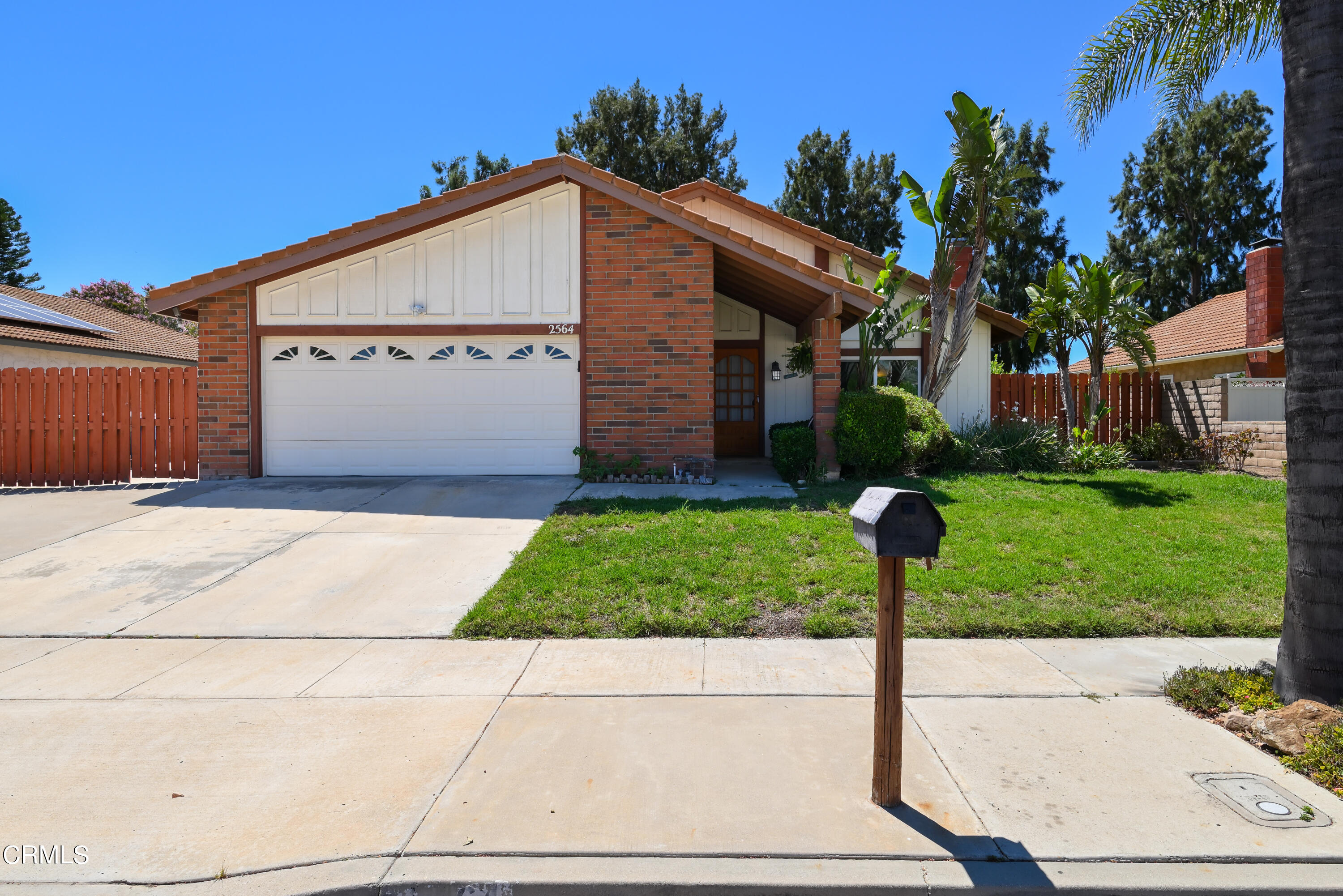 2564 Roxy Street Simi Valley, CA 93065 - Photo 2 of 25 a front view of house with yard and green space