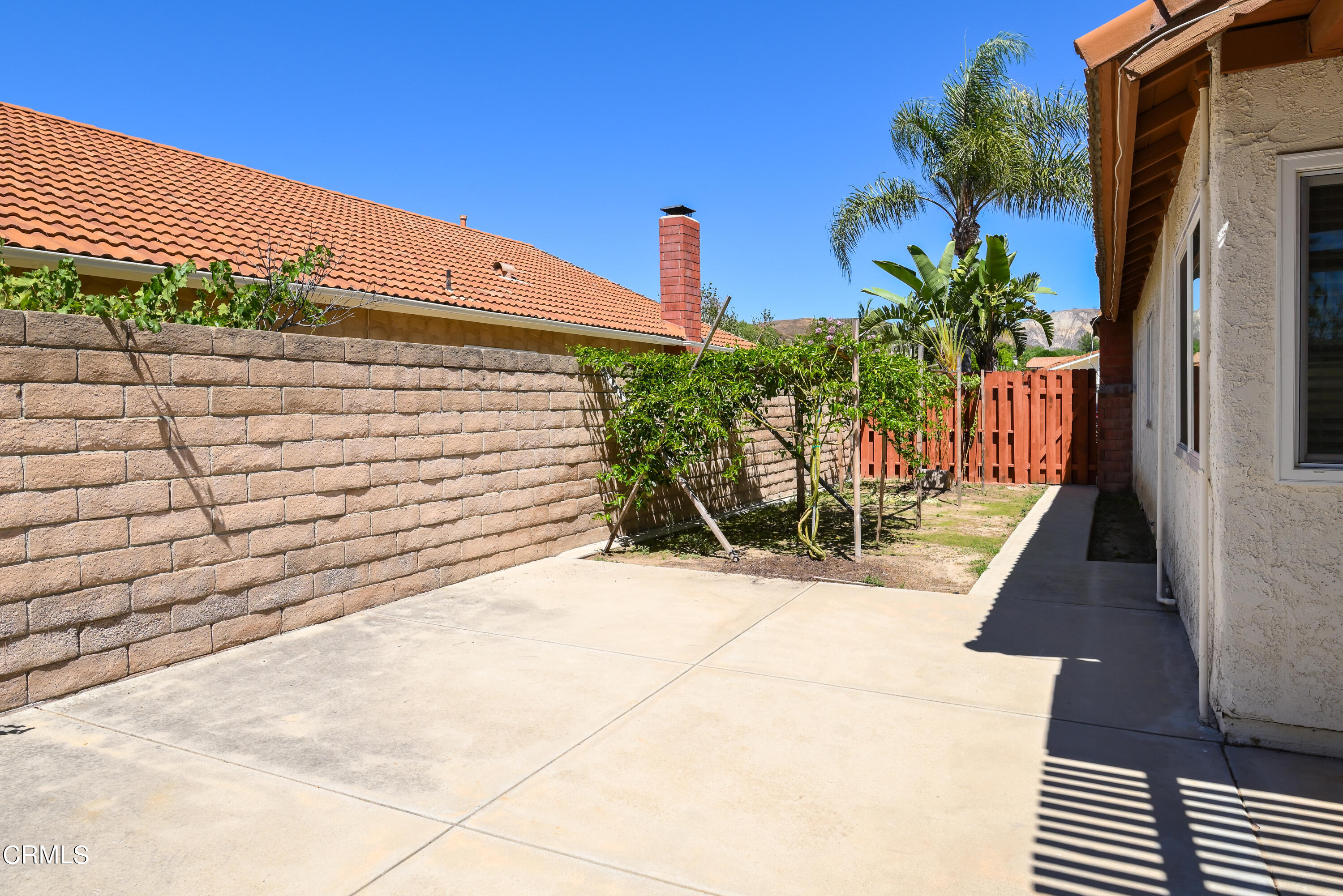2564 Roxy Street Simi Valley, CA 93065 - Photo 22 of 25 a view of a backyard with chairs