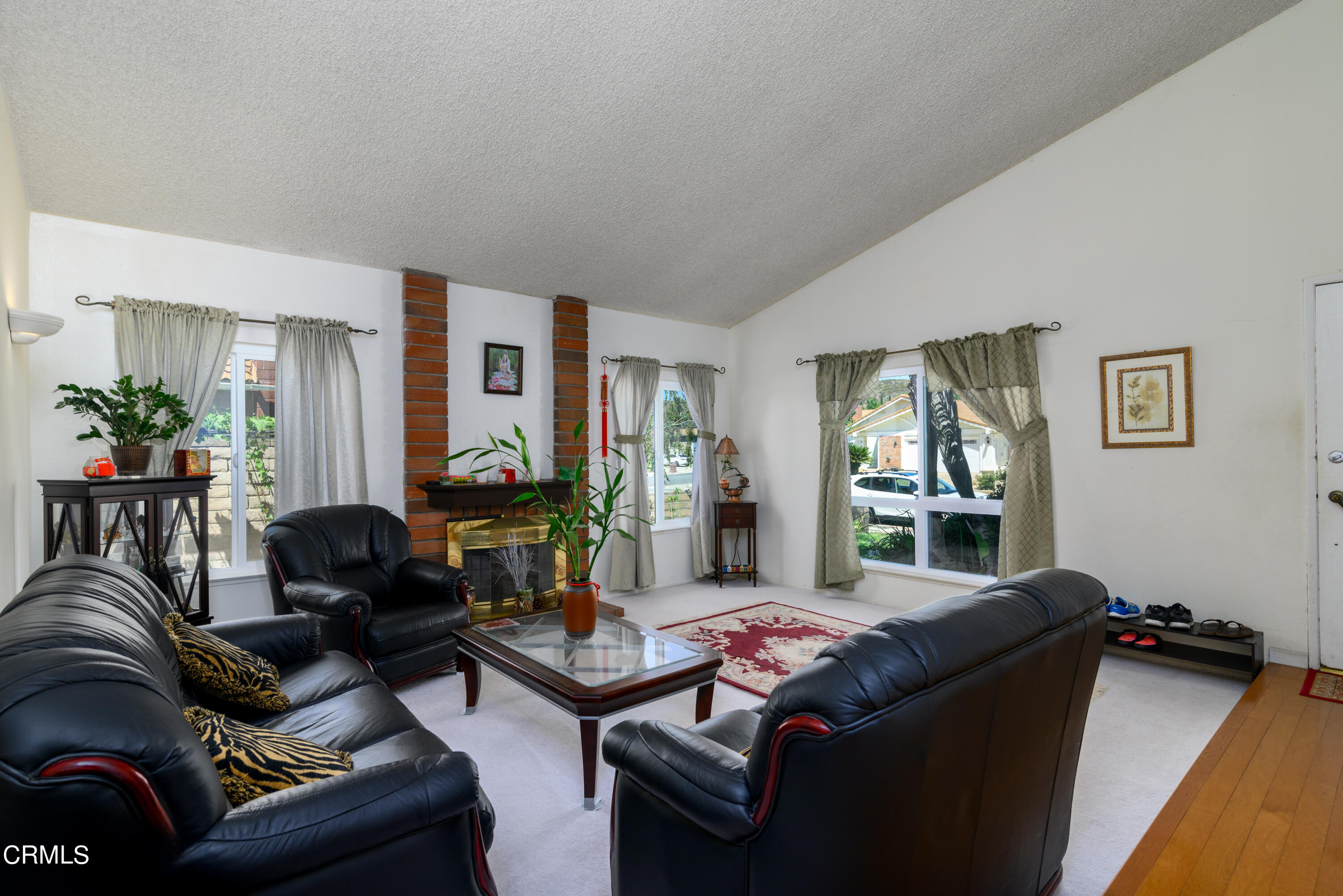 2564 Roxy Street Simi Valley, CA 93065 - Photo 5 of 25 a living room with furniture and a wooden floor