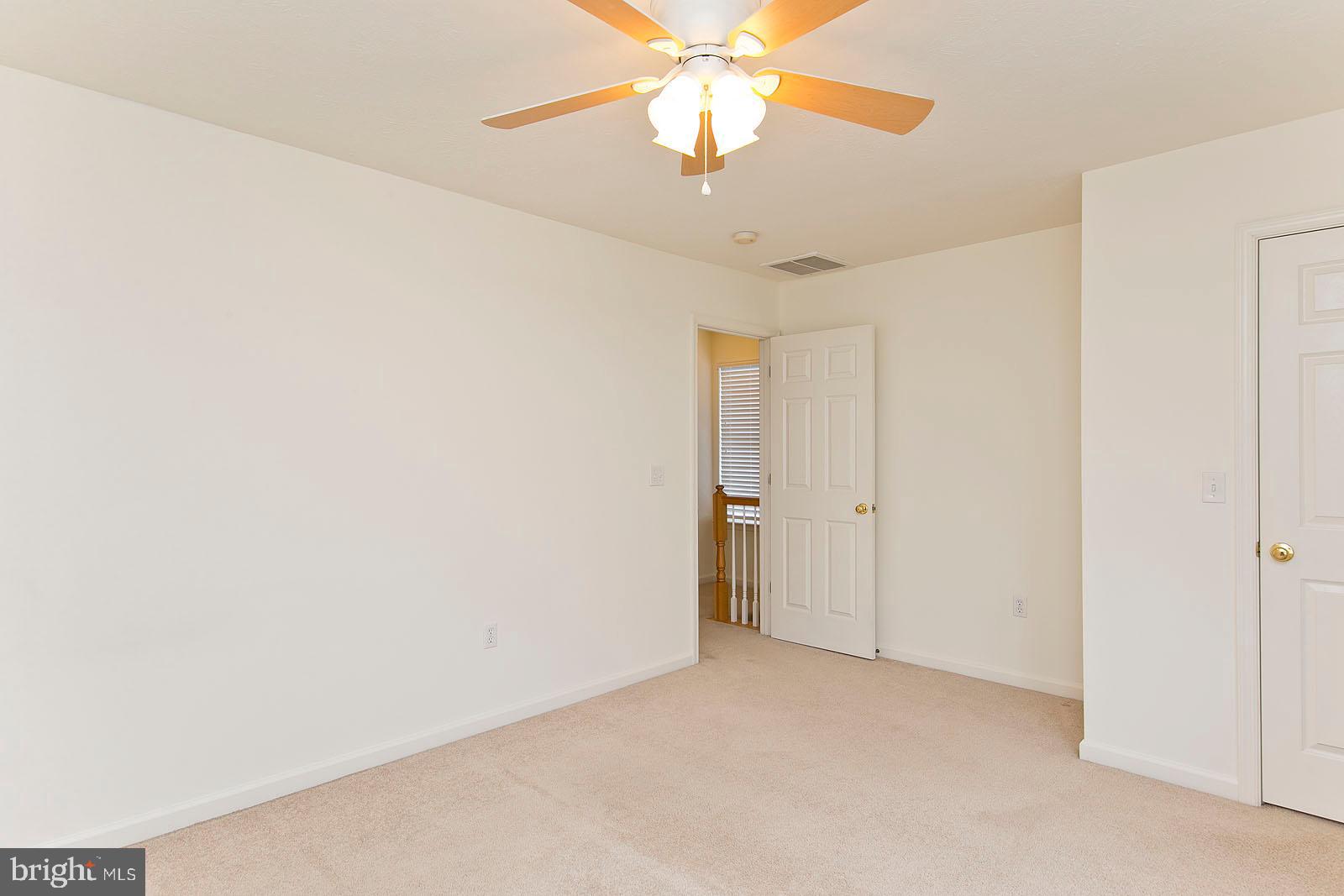 100 Scirocco Lane Winchester, VA 22602 - Photo 21 of 37 a view of a chandelier fan in a room