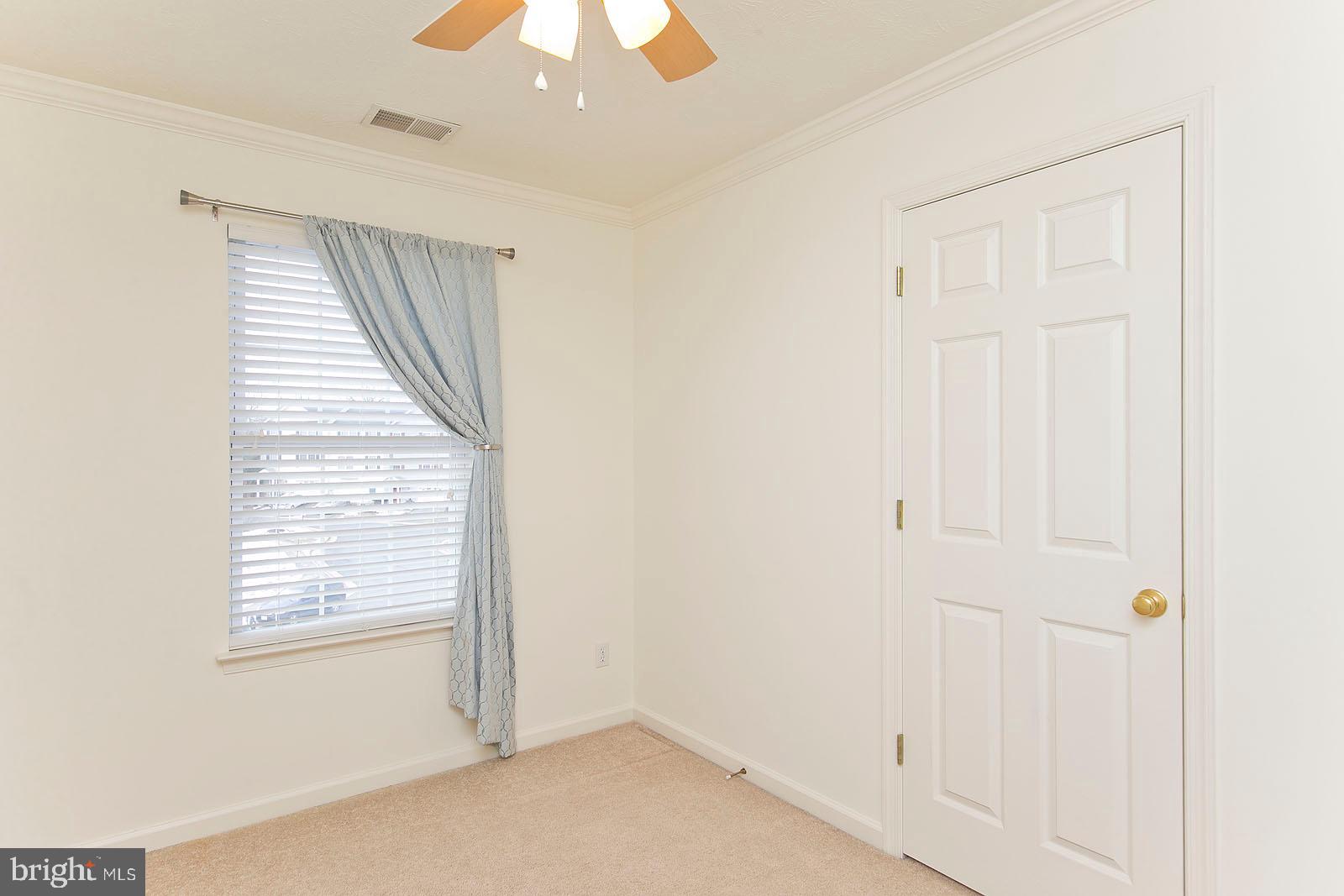 100 Scirocco Lane Winchester, VA 22602 - Photo 28 of 37 an empty room with windows