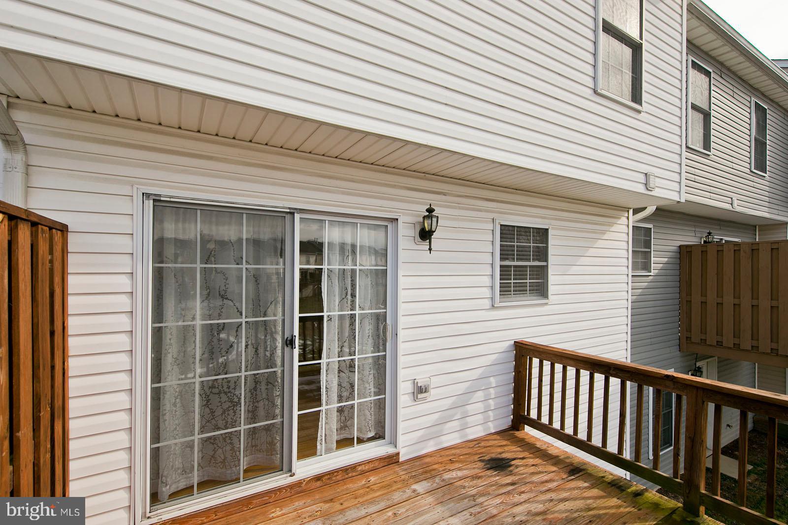 100 Scirocco Lane Winchester, VA 22602 - Photo 8 of 37 a view of a house with a window