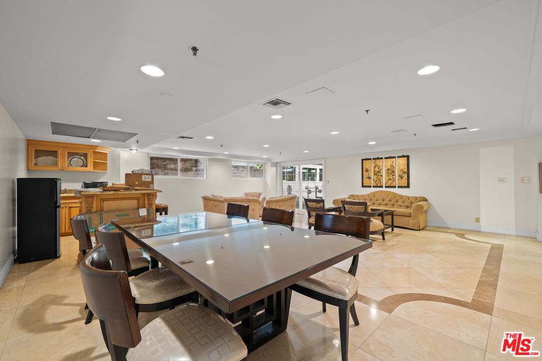 321 North Oakhurst Drive, Unit 403 Beverly Hills, CA 90210 - Photo 28 of 42 a view of a dining area with furniture