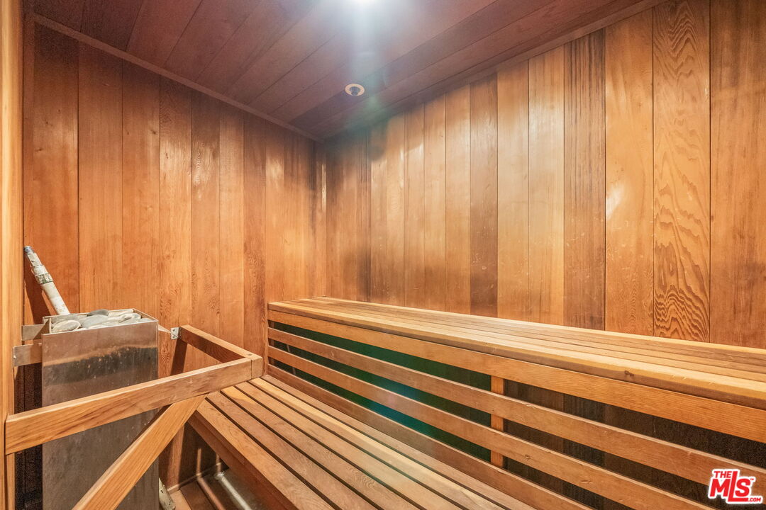 321 North Oakhurst Drive, Unit 403 Beverly Hills, CA 90210 - Photo 29 of 42 a view of a utility room with a sink and stairs